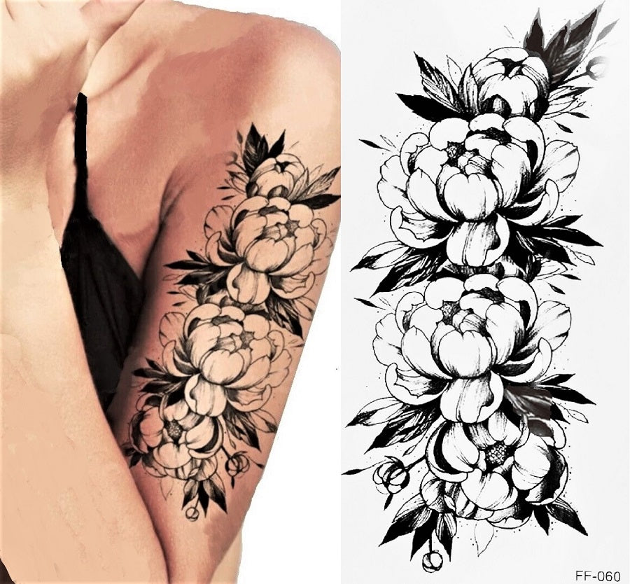 Klebetattoo Blumenmotiv Rosenknospen auf Frauenoberarm